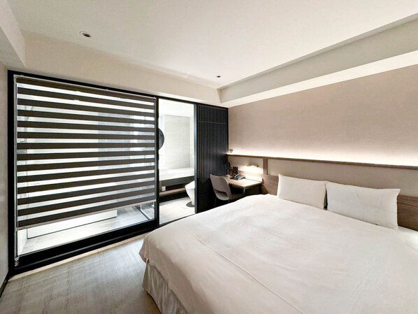 Habitación doble | Ropa de cama de alta calidad y camas con pillow-top