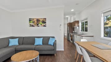 Deluxe 2 Bedroom Cabin - Sleeps 6 | Living area | LCD TV