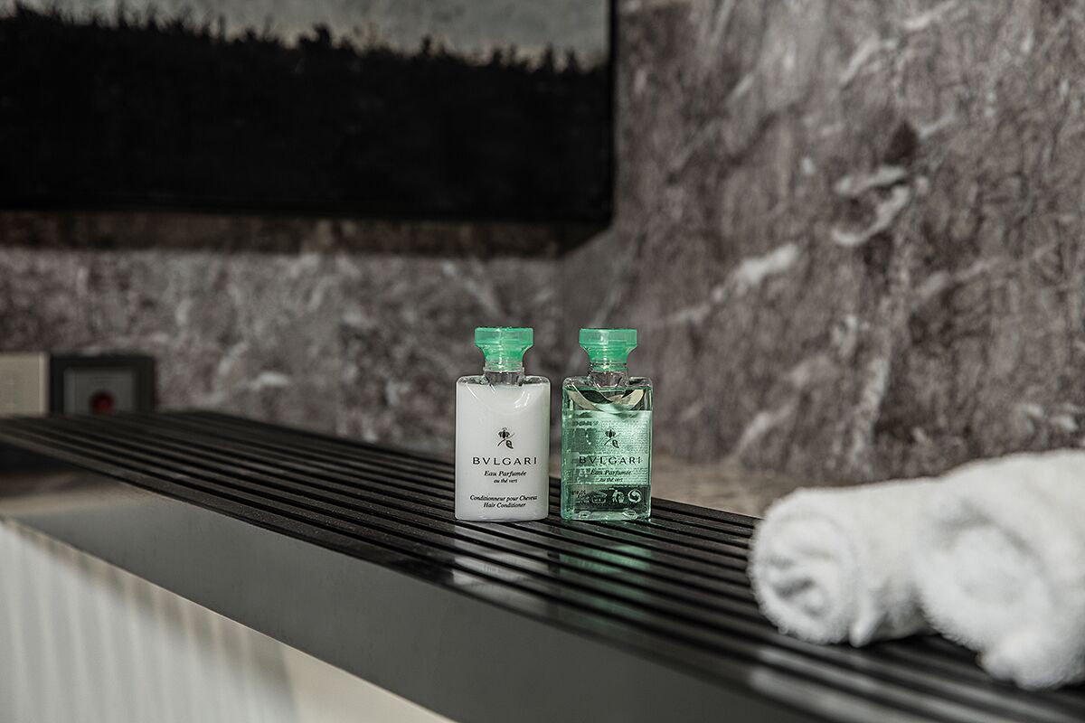 royal suite, 1 king bed | bathroom | separate bathtub and shower, rainfall showerhead, designer toiletries