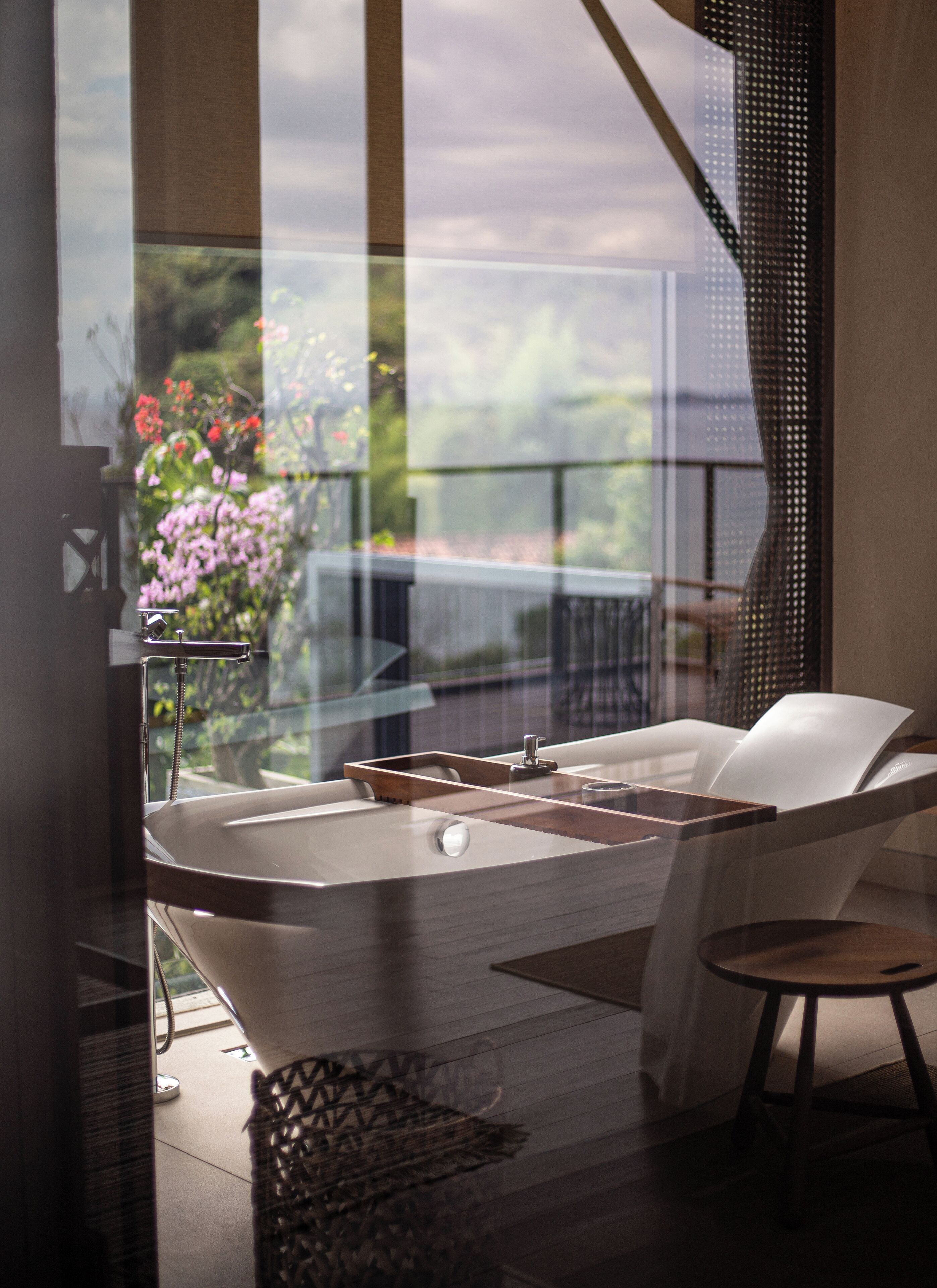 founder's home | bathroom | separate bathtub and shower, eco-friendly toiletries, hair dryer