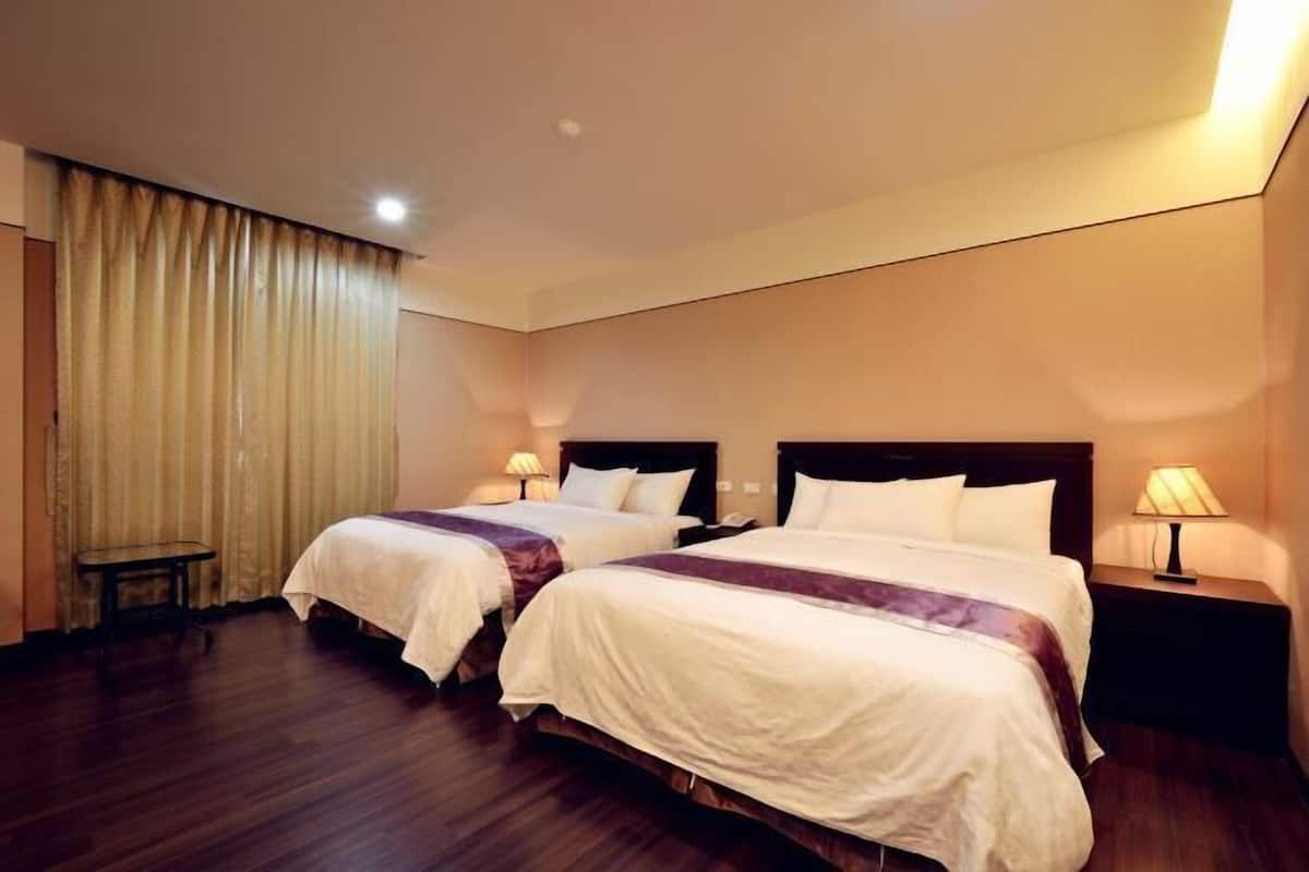 Edredons de pluma, cortinas blackout, Wi-Fi de cortesia, roupa de cama