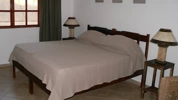 Cofres nos quartos, roupa de cama