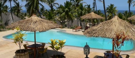 Outdoor pool, free pool cabanas, pool umbrellas