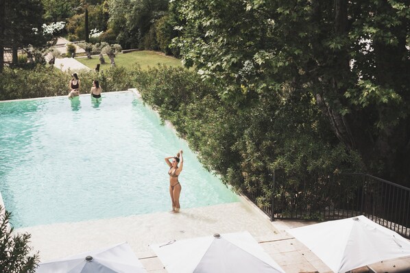 Indoor pool, seasonal outdoor pool, pool umbrellas, sun loungers