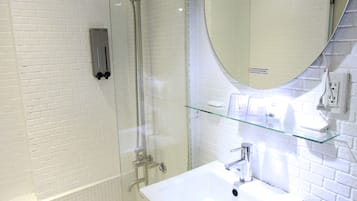 Shower, rainfall showerhead, hair dryer, towels