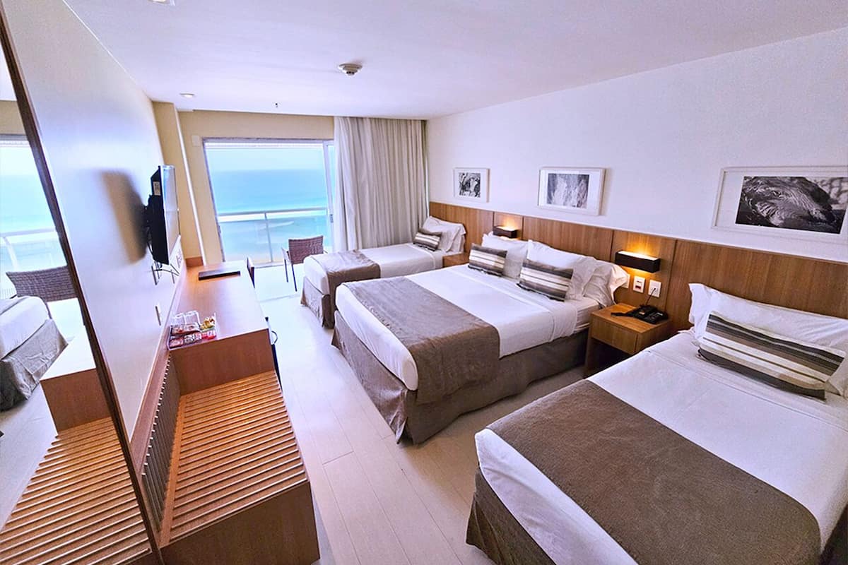 Superior Room, Bathtub, Partial Sea View | Minibar, in-room safe, blackout curtains, iron/ironing board