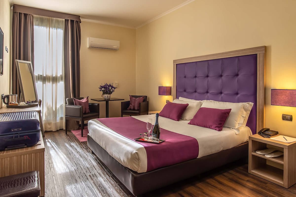 Deluxe Double Room, 1 Queen Bed | Minibar, in-room safe, desk, laptop workspace