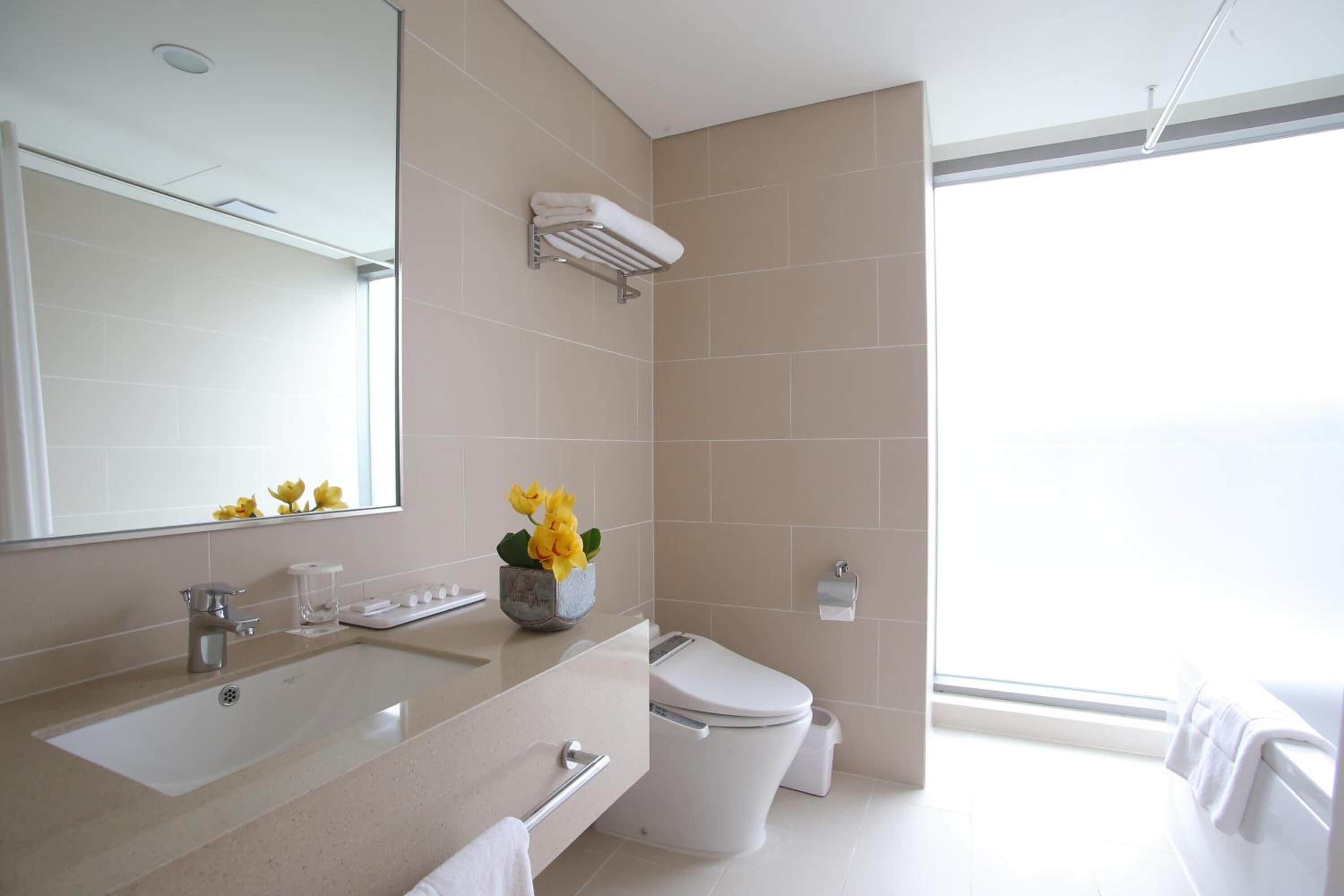 combined shower/bathtub, deep-soaking bathtub, designer toiletries