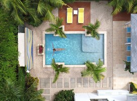 Outdoor pool, open 8:00 AM to 10:00 PM, sun loungers
