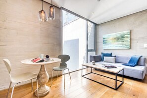 Premium Suite (Double) | Living area | 55-inch Smart TV with digital channels, TV, Netflix