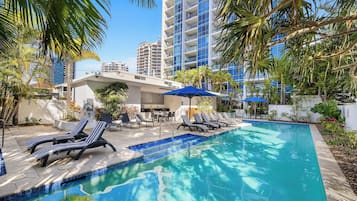 Outdoor pool, a heated pool, sun loungers