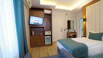 Habitació familiar | Roba de llit d'alta qualitat, minibar i caixa forta a l'habitació