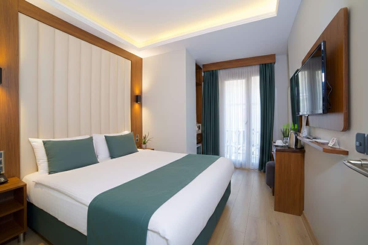 Hochwertige Bettwaren, Minibar, Zimmersafe, kostenloses WLAN