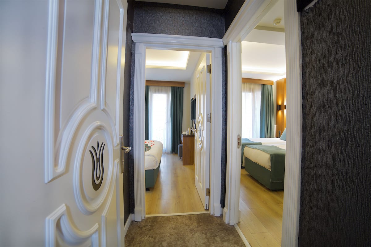 Family Connecting Room With Balcony | Premium bedding, minibar, in-room safe, free WiFi