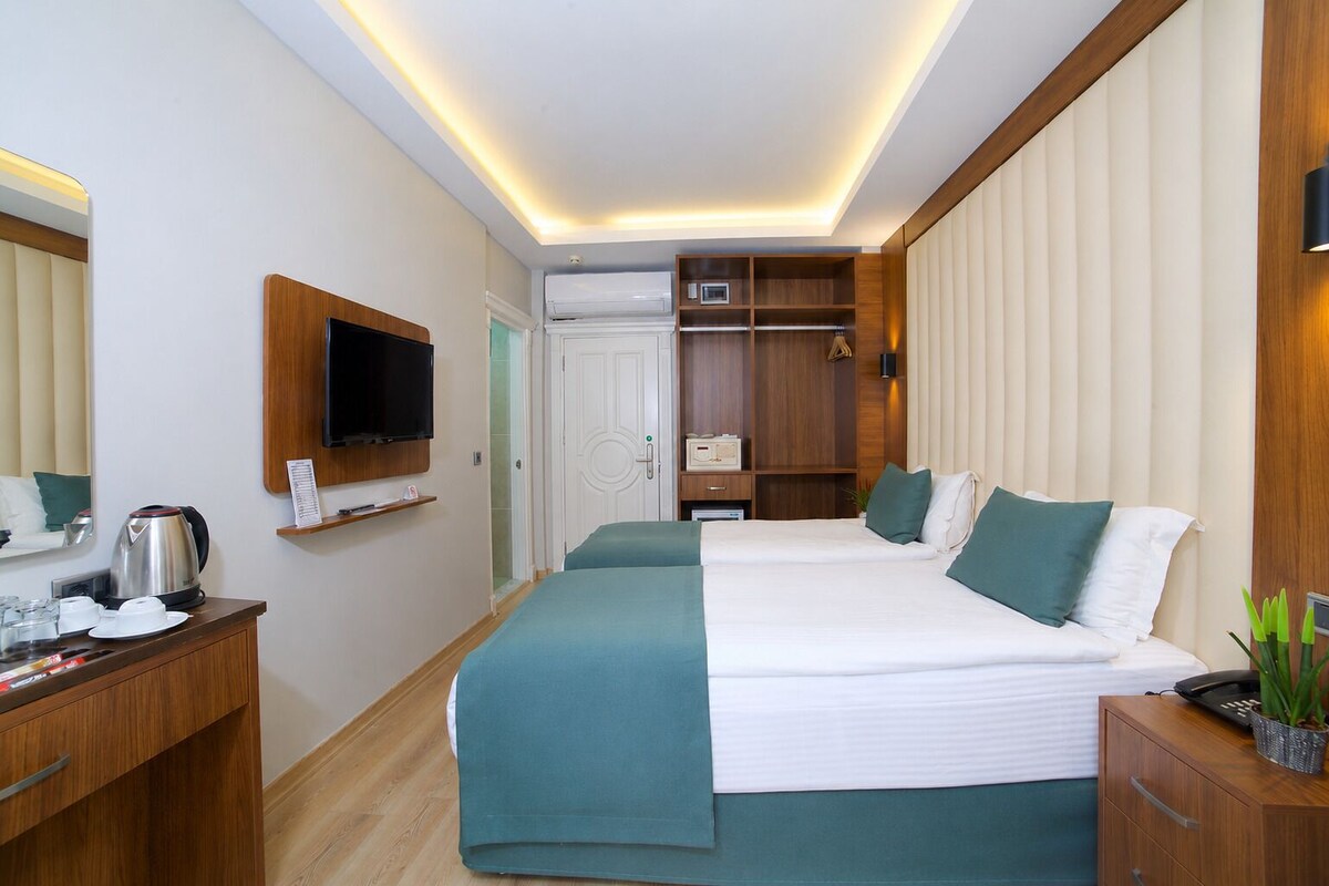 Ropa de cama de alta calidad, minibar, caja fuerte y wifi gratis