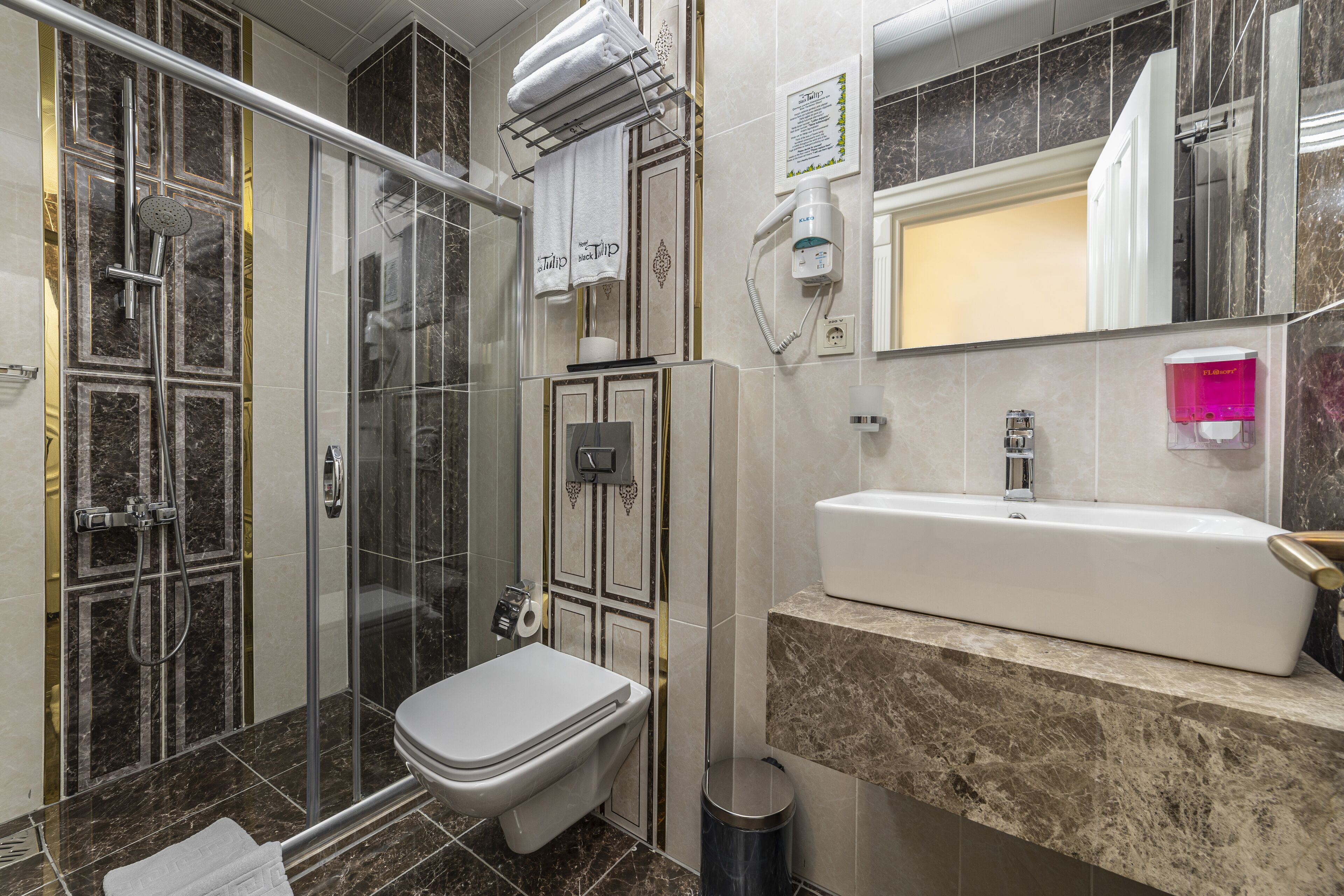 standard triple room | bathroom | shower, hair dryer, slippers, towels