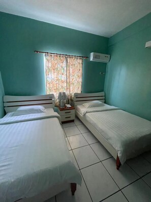 Standard Room, 2 Twin Beds | Premium bedding, down comforters, pillowtop beds, in-room safe - Capital Hotel (Saipan)