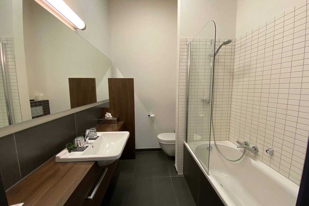 comfort deluxe room | bathroom | free toiletries, hair dryer, towels, soap