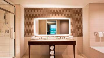 Combined shower/bathtub, designer toiletries, hair dryer, bathrobes