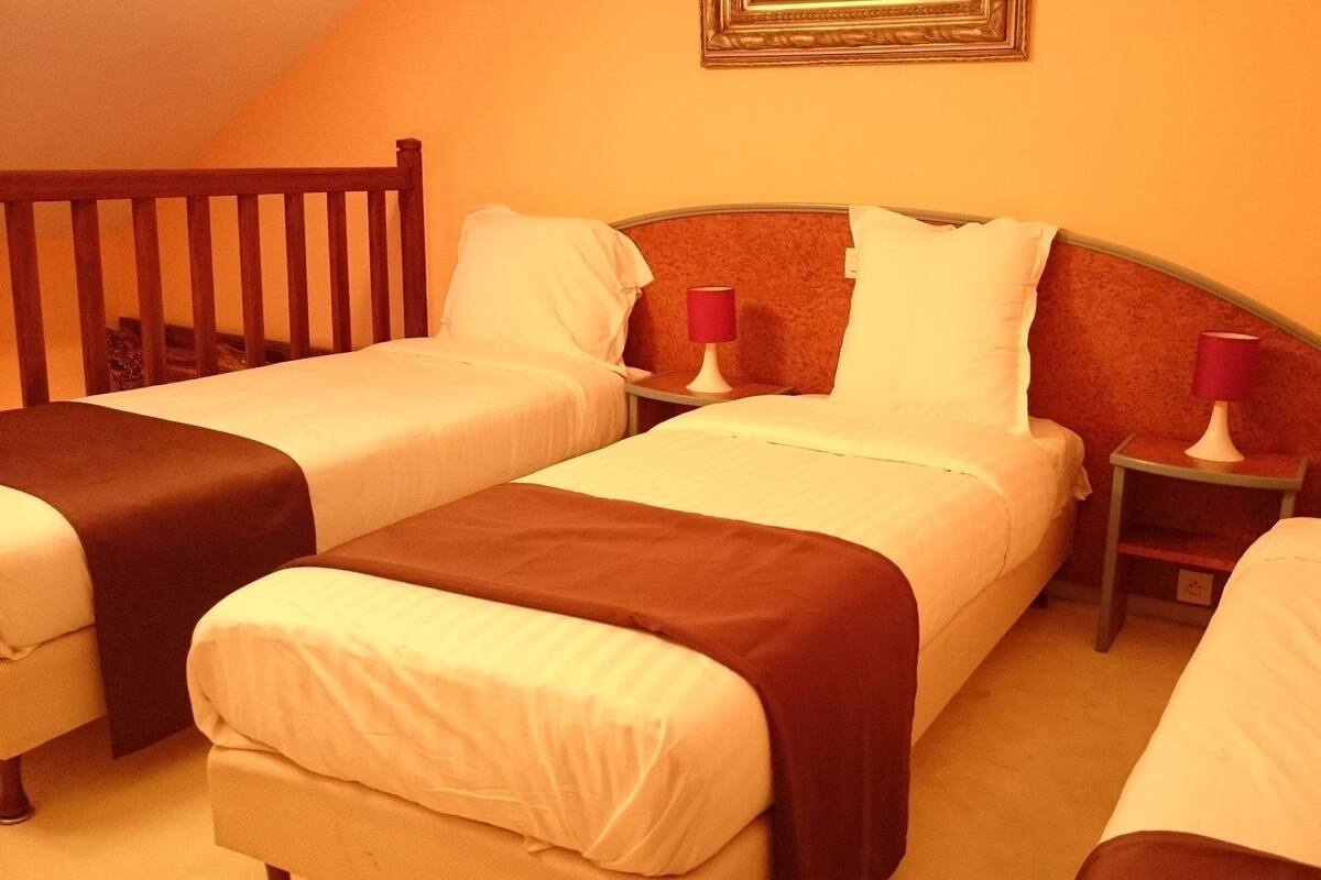 Deluxe Triple Room