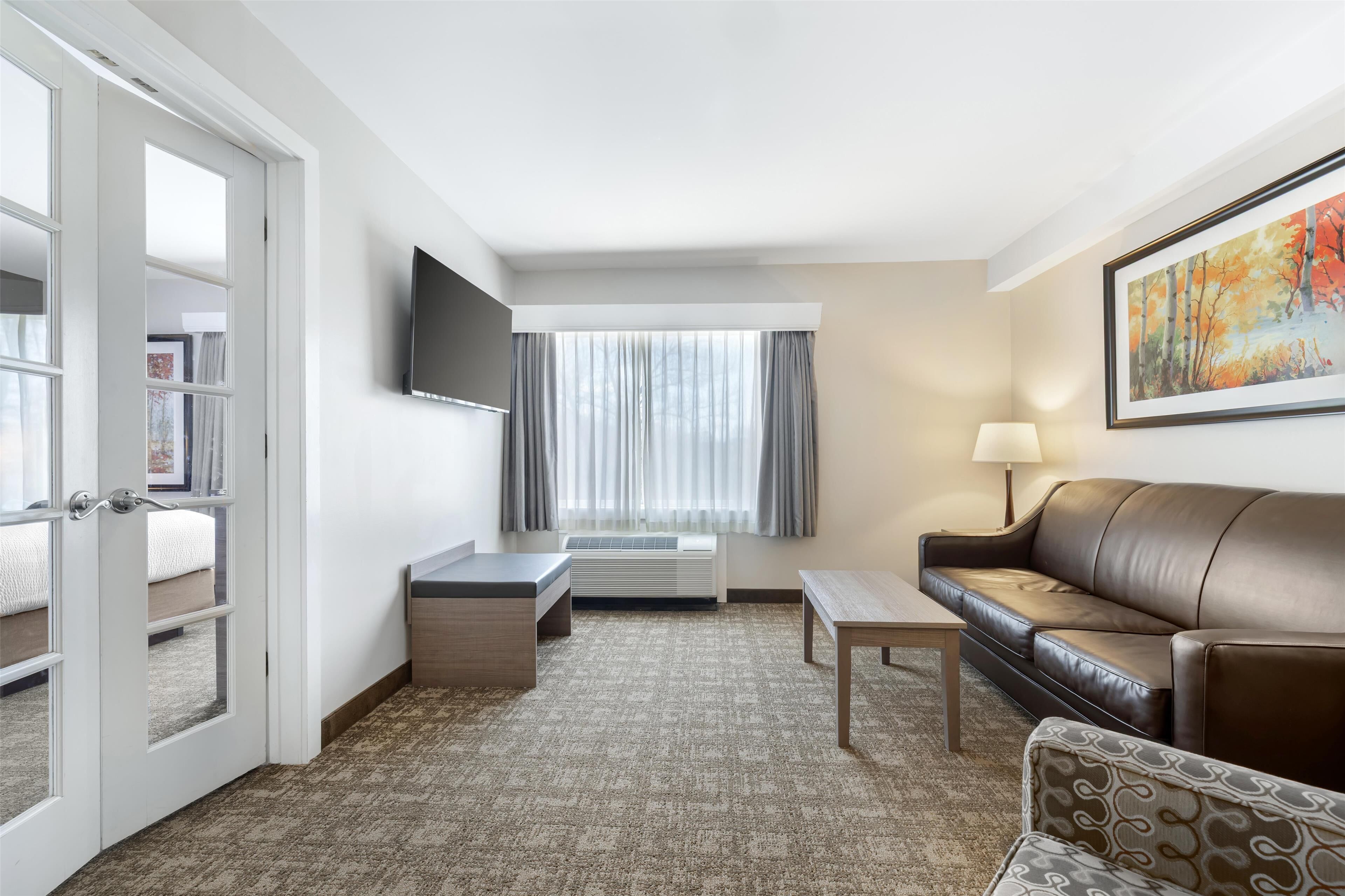 suite, 1 king bed, non smoking, refrigerator & microwave (no pets in room type) | blackout curtains, iron/ironing board, free cots/infant beds