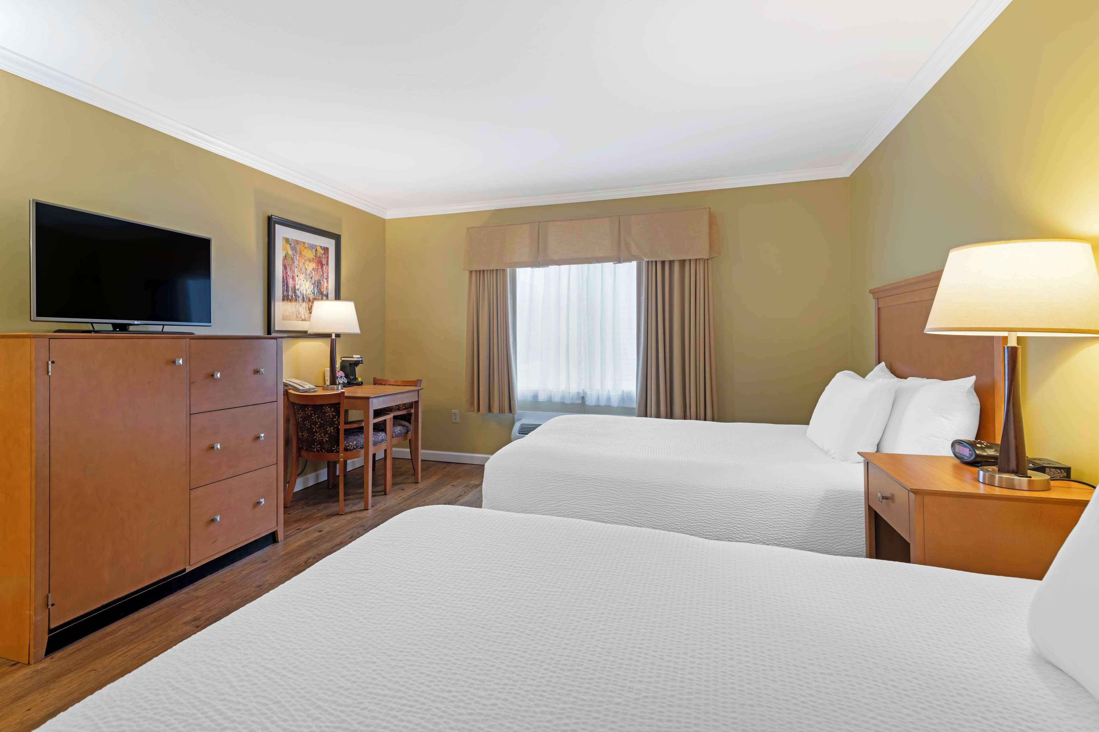 Blackout drapes, iron/ironing board, free cribs/infant beds