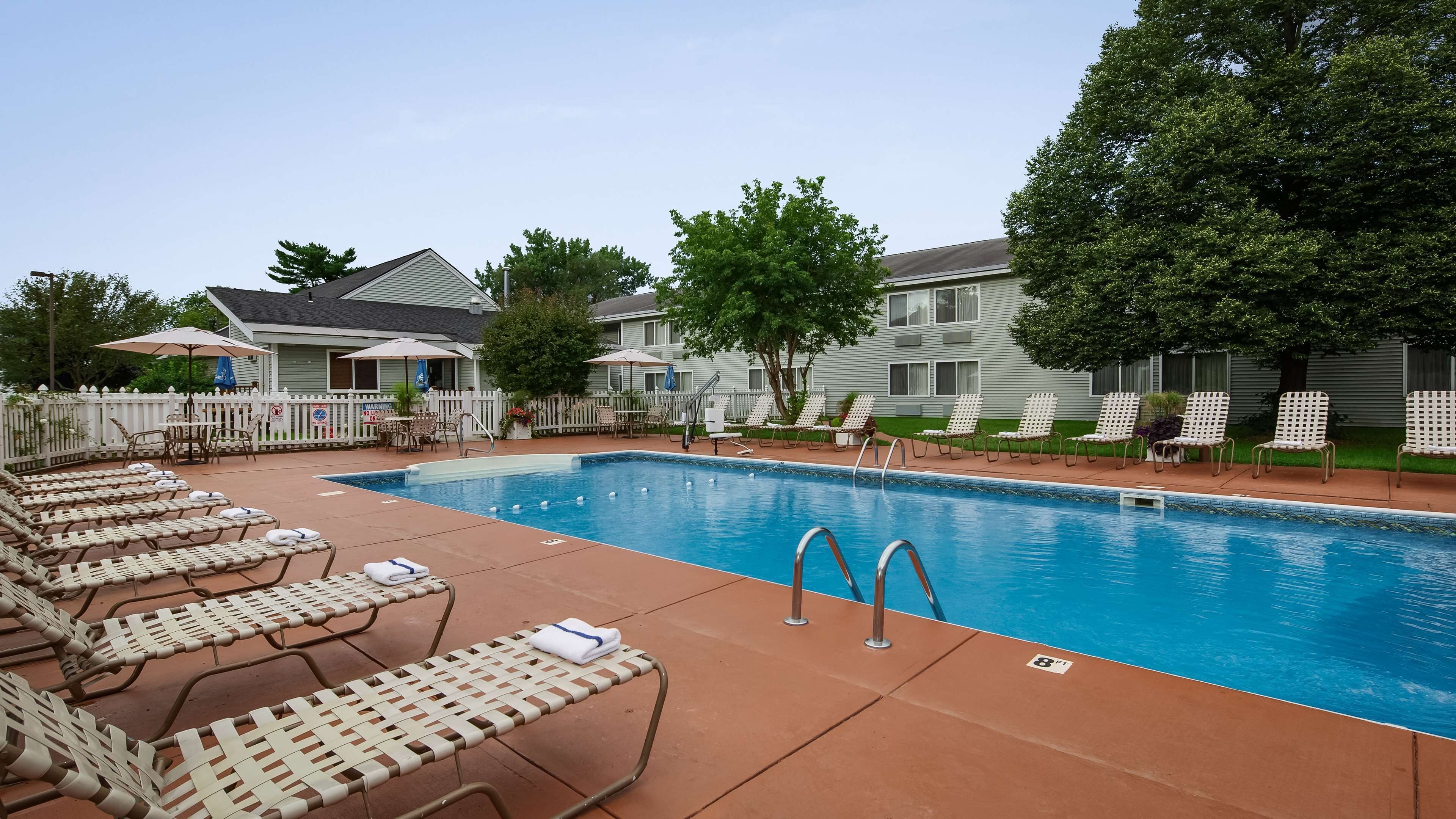 indoor pool, outdoor pool, pool umbrellas, pool loungers