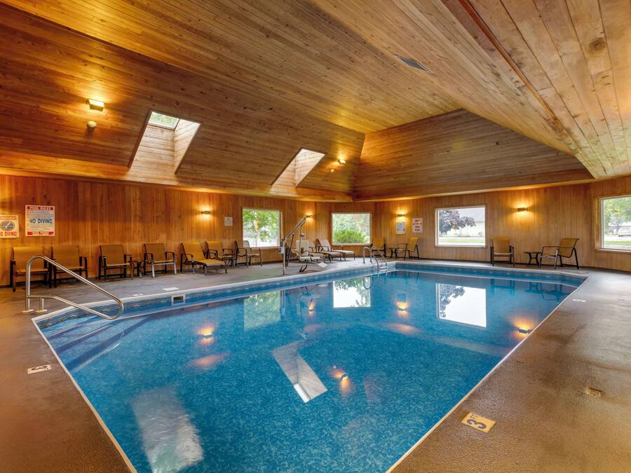 Indoor pool, outdoor pool, pool umbrellas, pool loungers