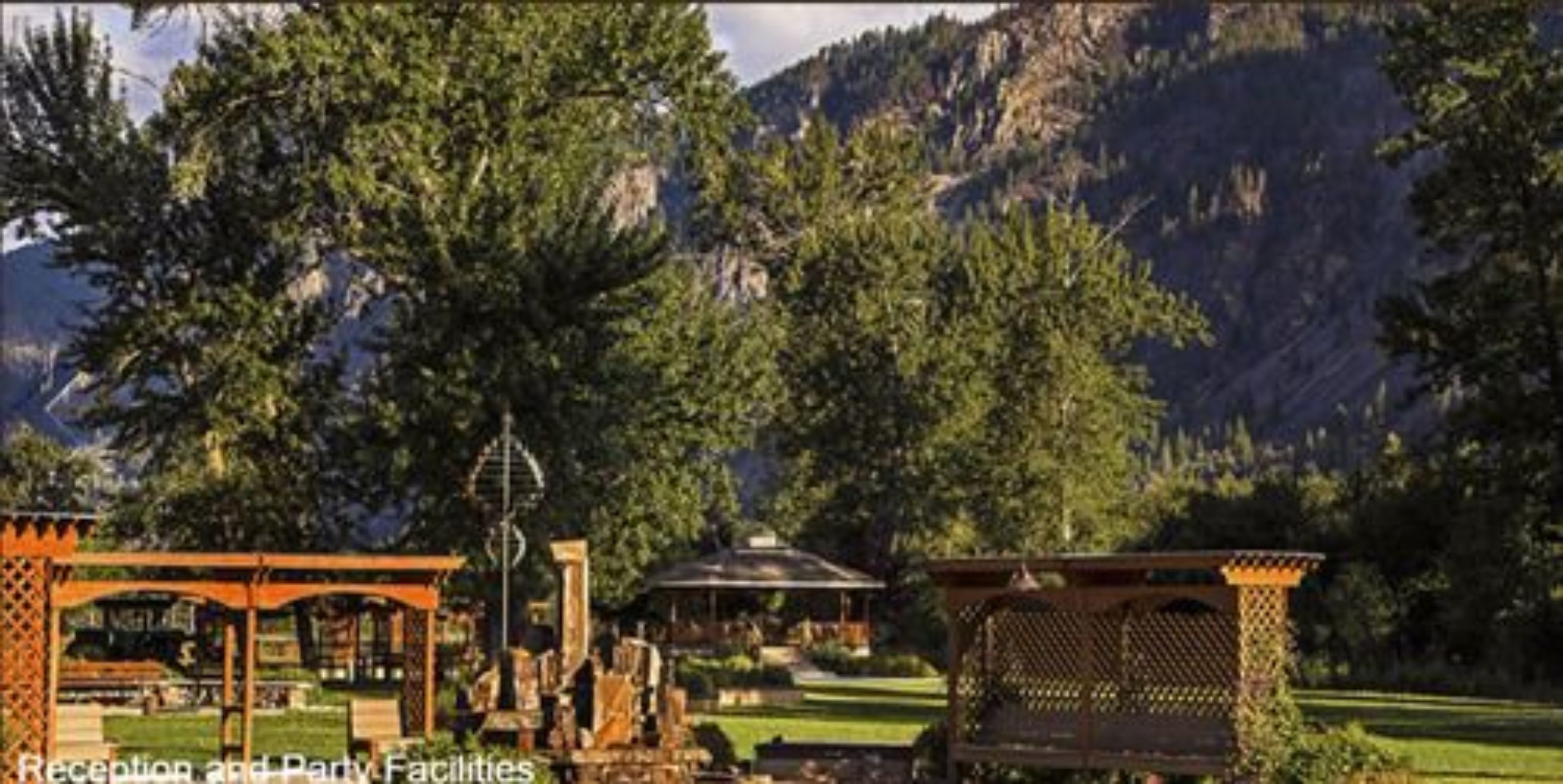 Reception and party facilities with a gazebo, pergola, and outdoor seating area in a mountainous landscape.