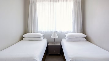 Apartamento luxo, 4 quartos, 2 banheiros | Roupas de cama premium, cofres nos quartos, individualmente decorados