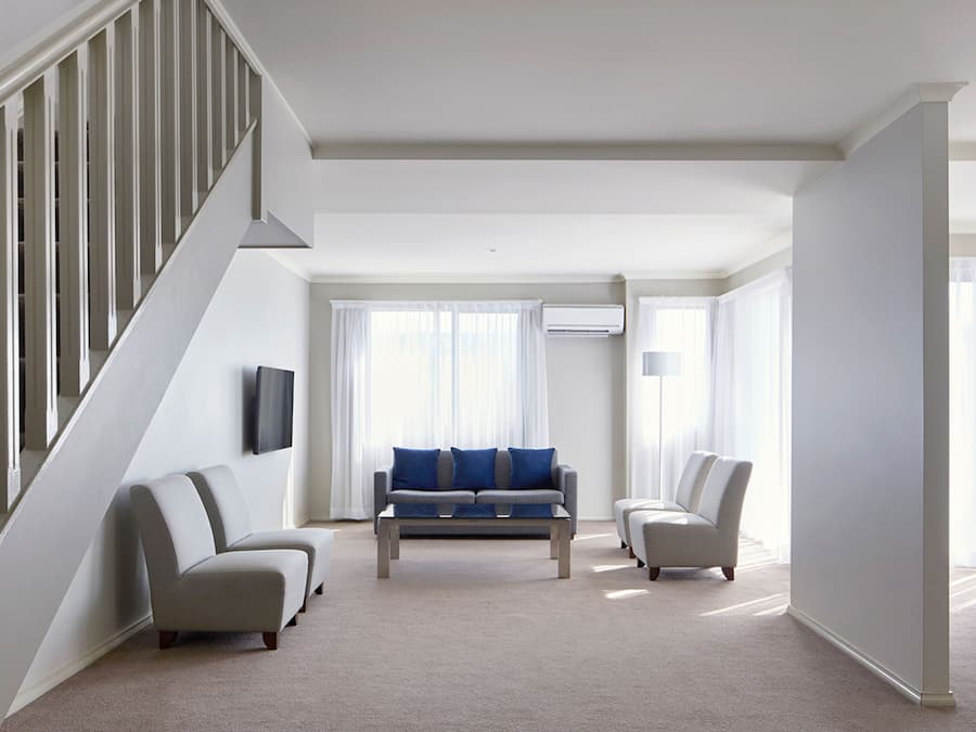 Three Bedroom Deluxe Apartment (2nd Floor - Stairs Only) | Living area | 30-inch LCD TV with premium TV channels, TV