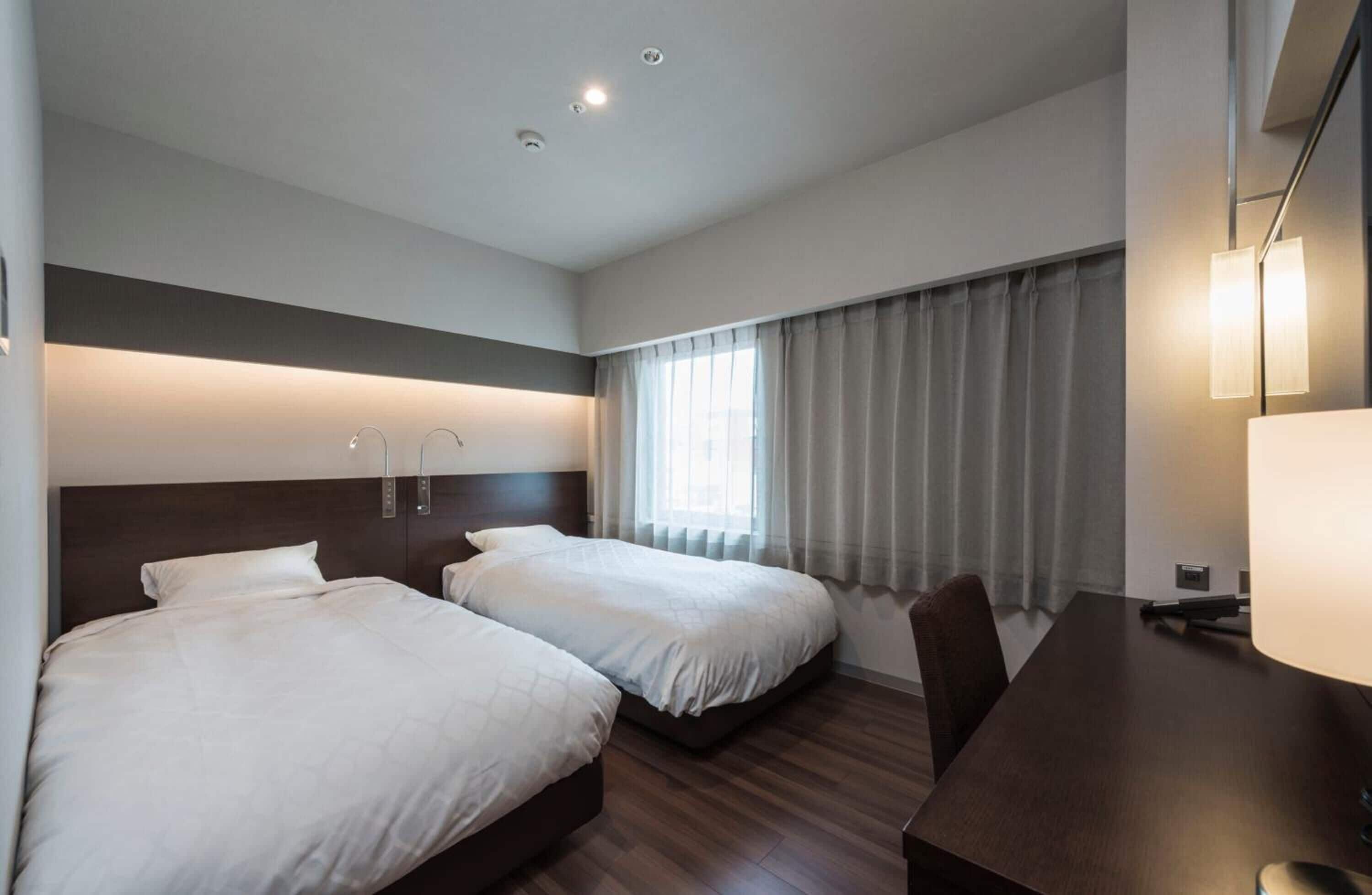 down duvets, desk, blackout curtains, iron/ironing board