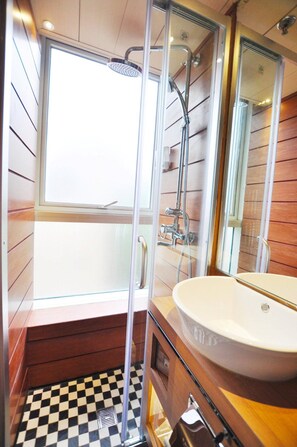 Shower, hair dryer, slippers, towels