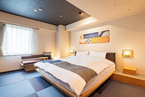 Cubrecamas, tabla de planchar con plancha, wifi gratis y ropa de cama 