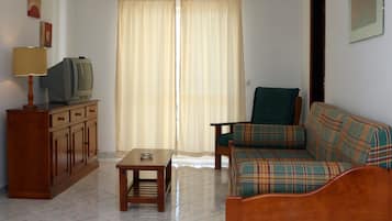 Apartment, 1 Bedroom | Living room | TV