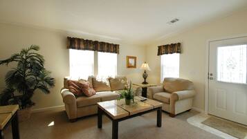 Standard Cottage, 1 Bedroom | Living room | Flat-screen TV