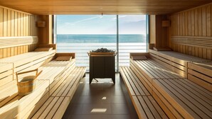A sauna with wooden benches and a view of the sea. - Bayside (Scharbeutz)