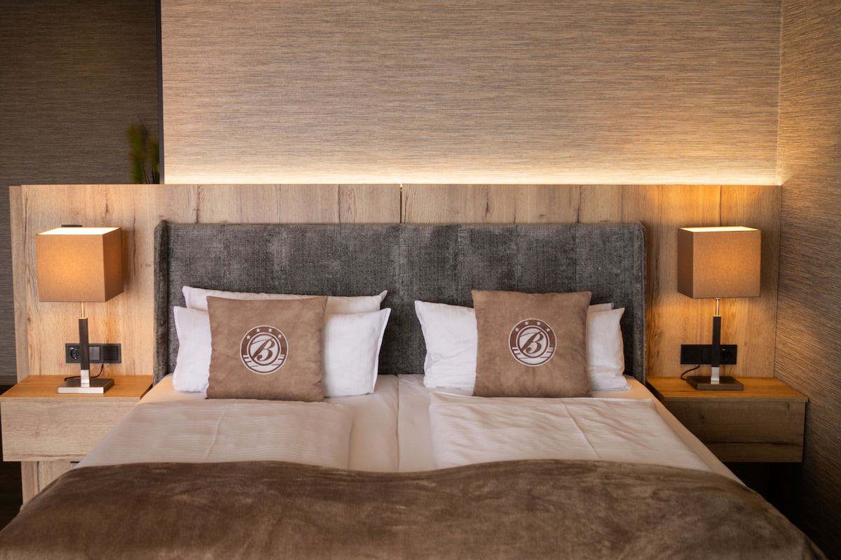 Hypo-allergenic bedding available, minibar (some free items)