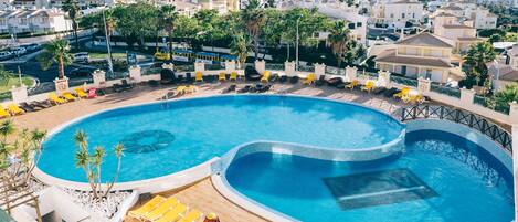 Indoor pool, outdoor pool, open 9:00 AM to 8:00 PM, pool umbrellas