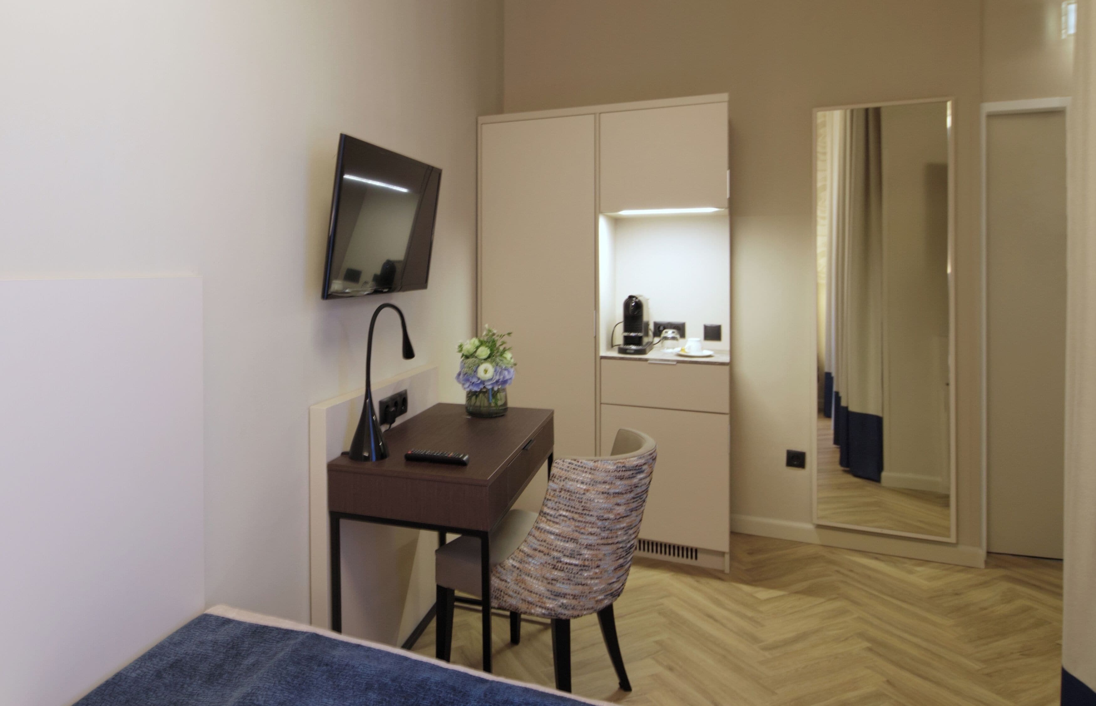 superior single room | in-room safe, desk, laptop workspace, blackout curtains