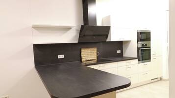 Minibar, bureau, chambres insonorisées, fer et planche à repasser