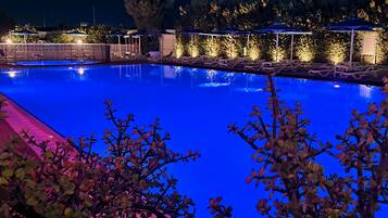 2 outdoor pools, pool umbrellas, pool loungers