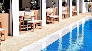 2 outdoor pools, pool umbrellas, pool loungers