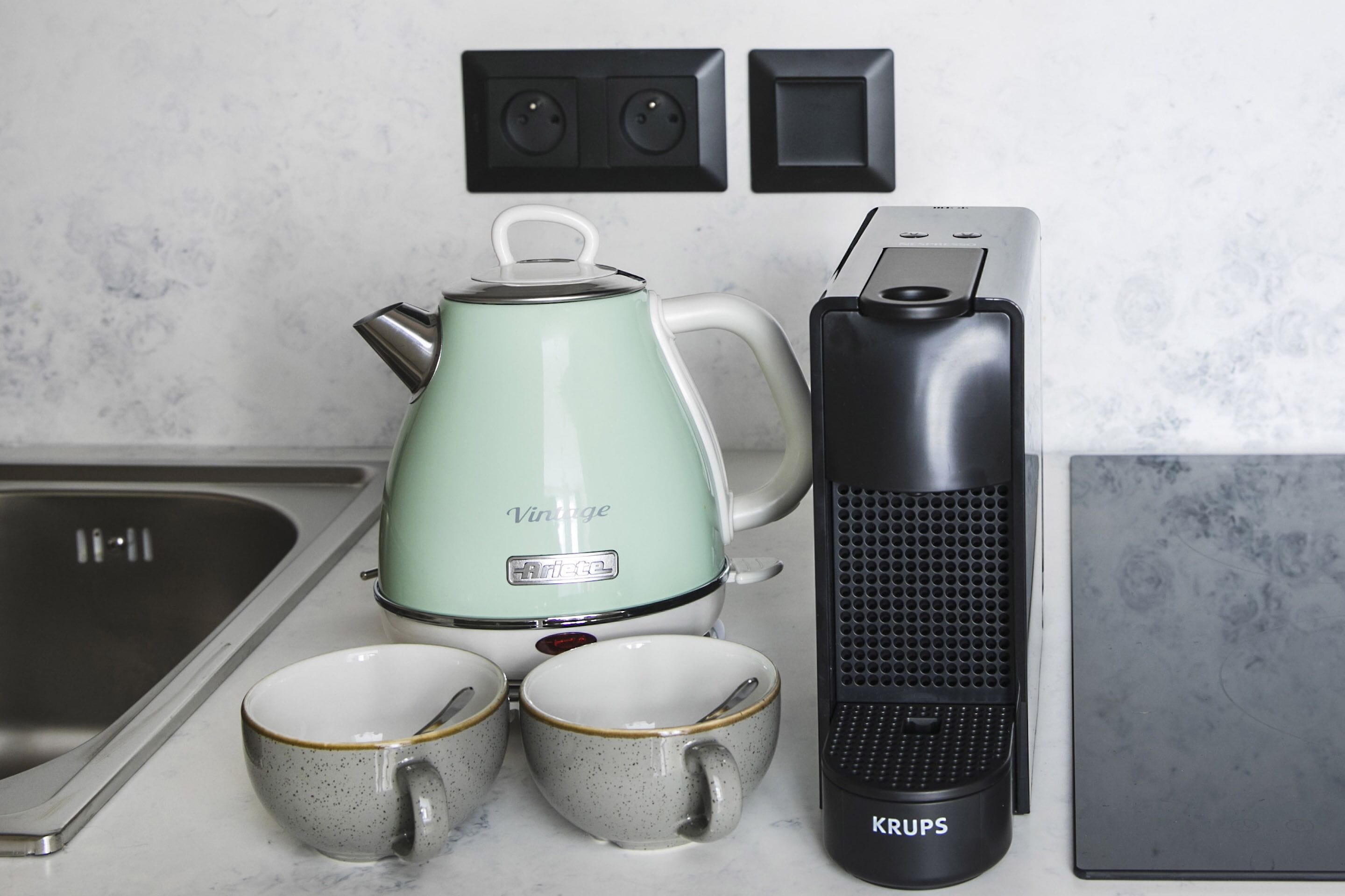 Espresso maker, coffee/tea maker, mini-fridge, electric kettle