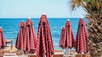 Private beach, sun loungers, beach umbrellas, beach towels