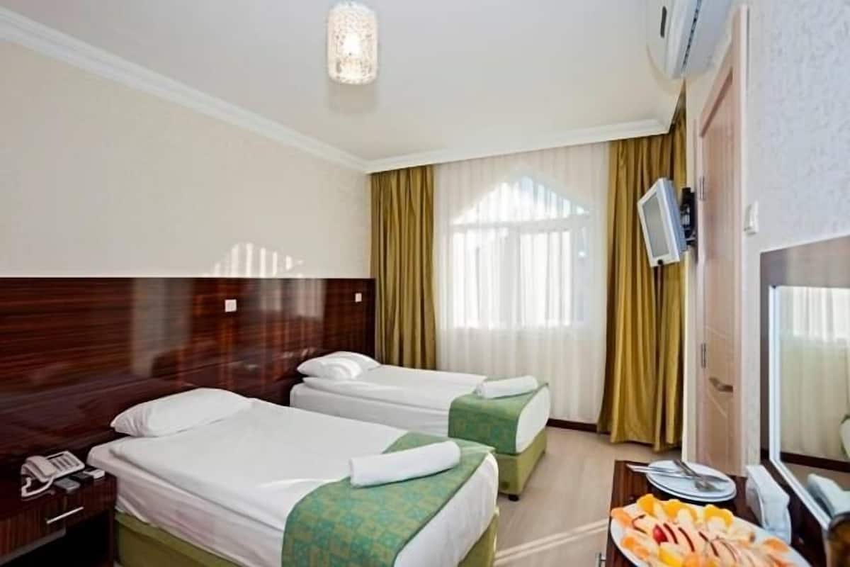 Kamar | Seprai premium, minibar, dan Wi-Fi gratis