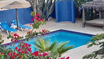 Outdoor pool, pool umbrellas, pool loungers