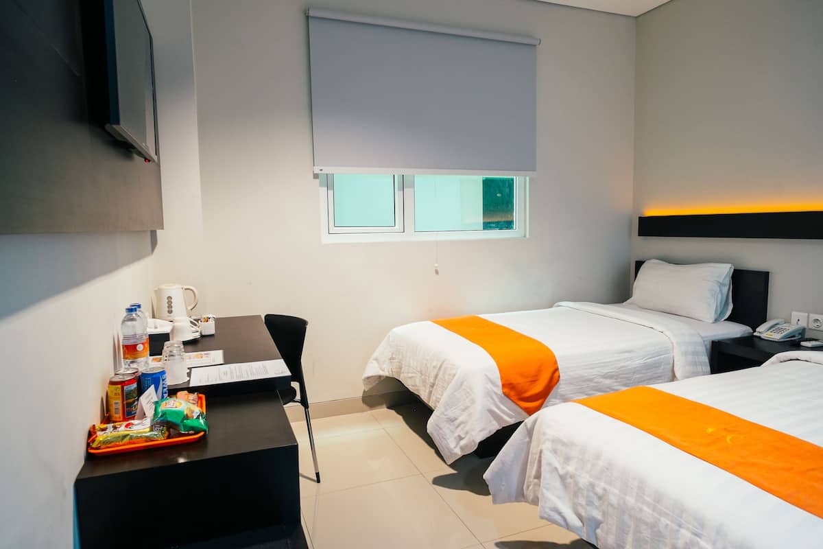 Deluxe Room | Premium bedding, in-room safe, desk, blackout curtains