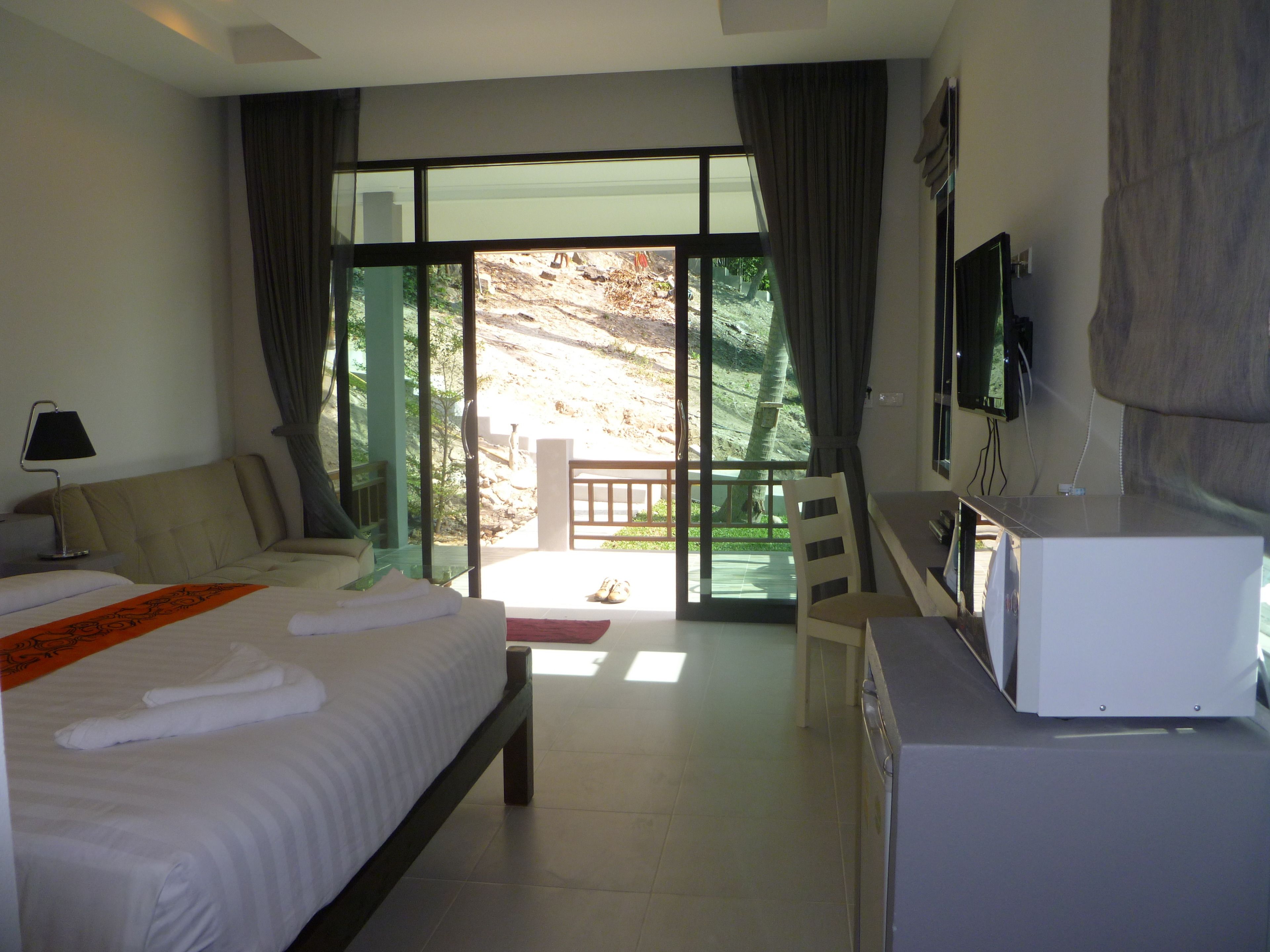 villa, 1 double bed, garden view | 1 bedroom, minibar, in-room safe, desk