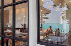 Breakfast, lunch, dinner served; international cuisine, beach views